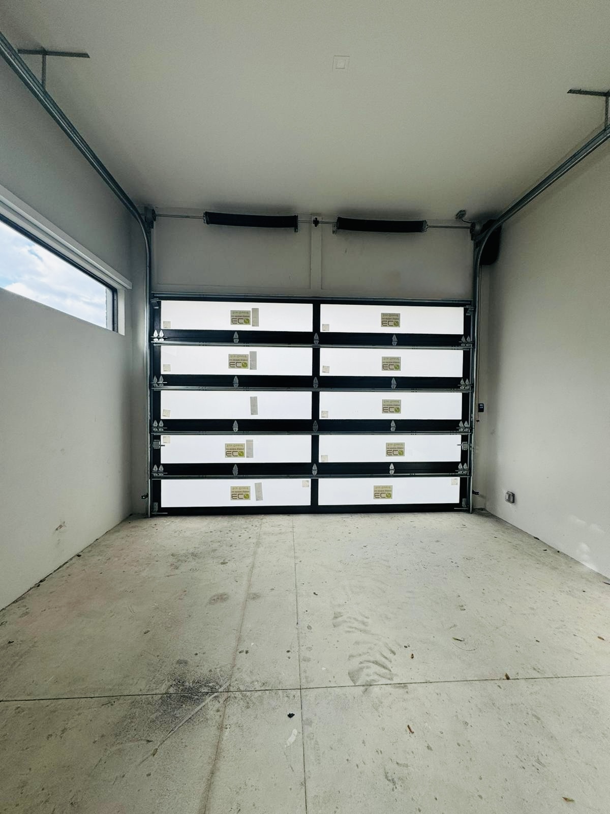 2-Car Full-Glass Garage Door in Bronze finish