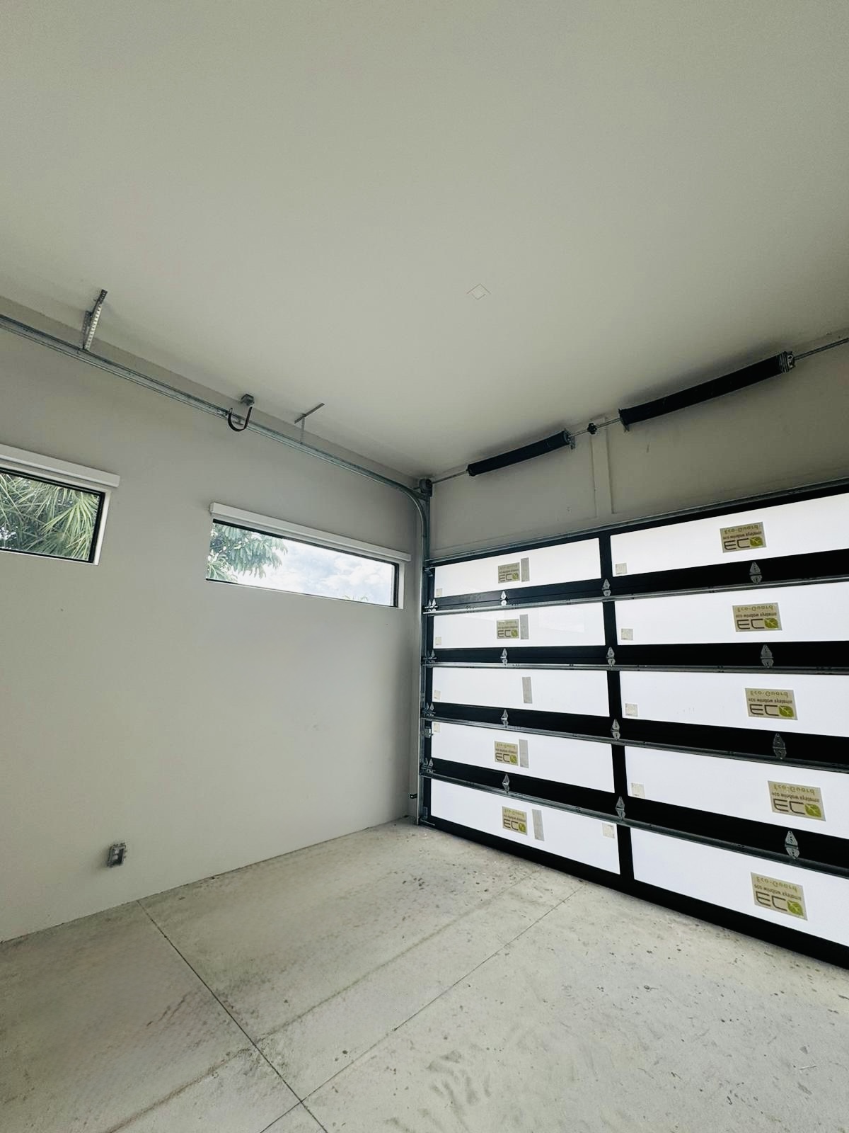 2-Car Full-Glass Garage Door in Bronze finish