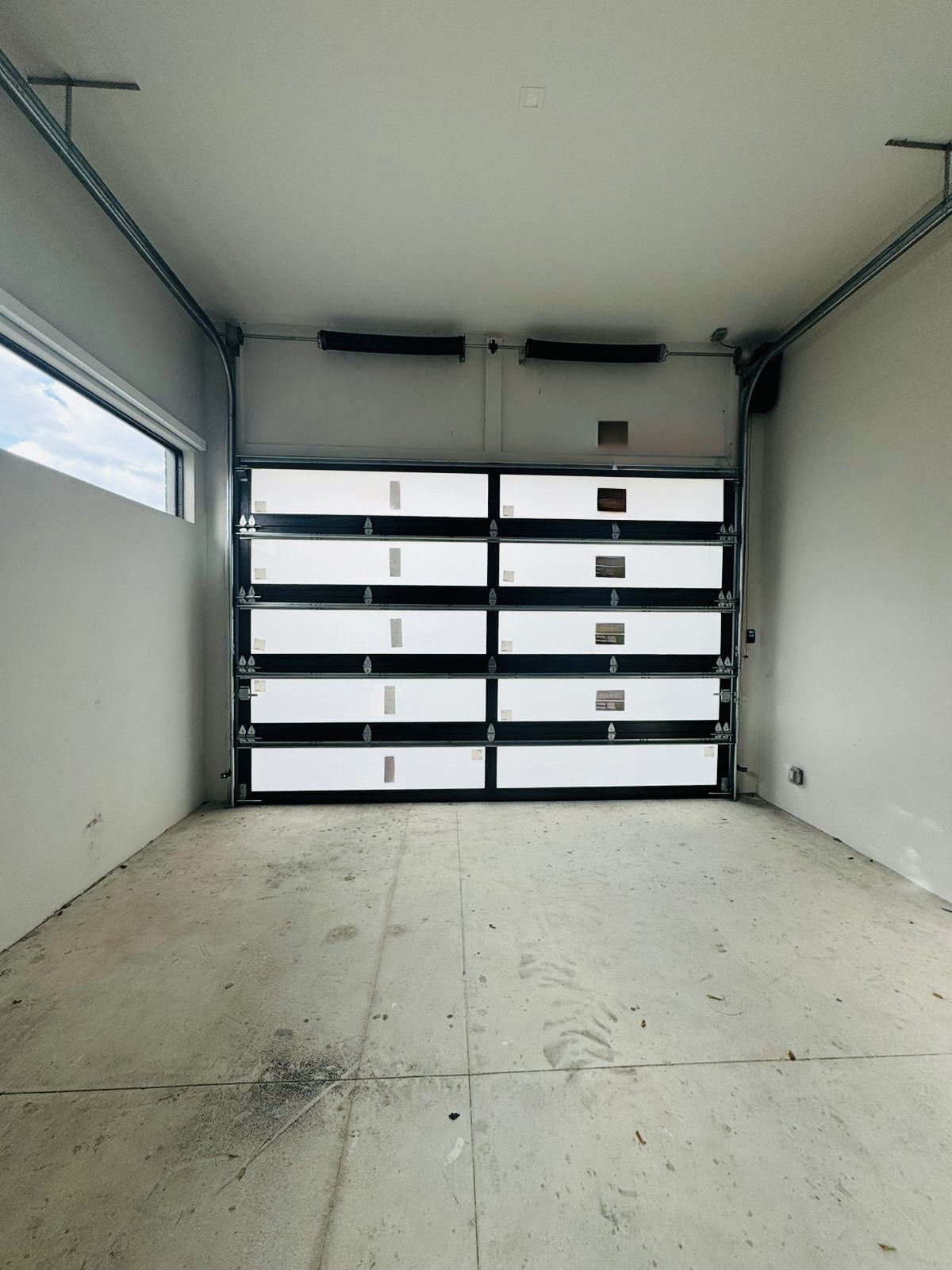 2-Car Full-Glass Garage Door in Bronze finish